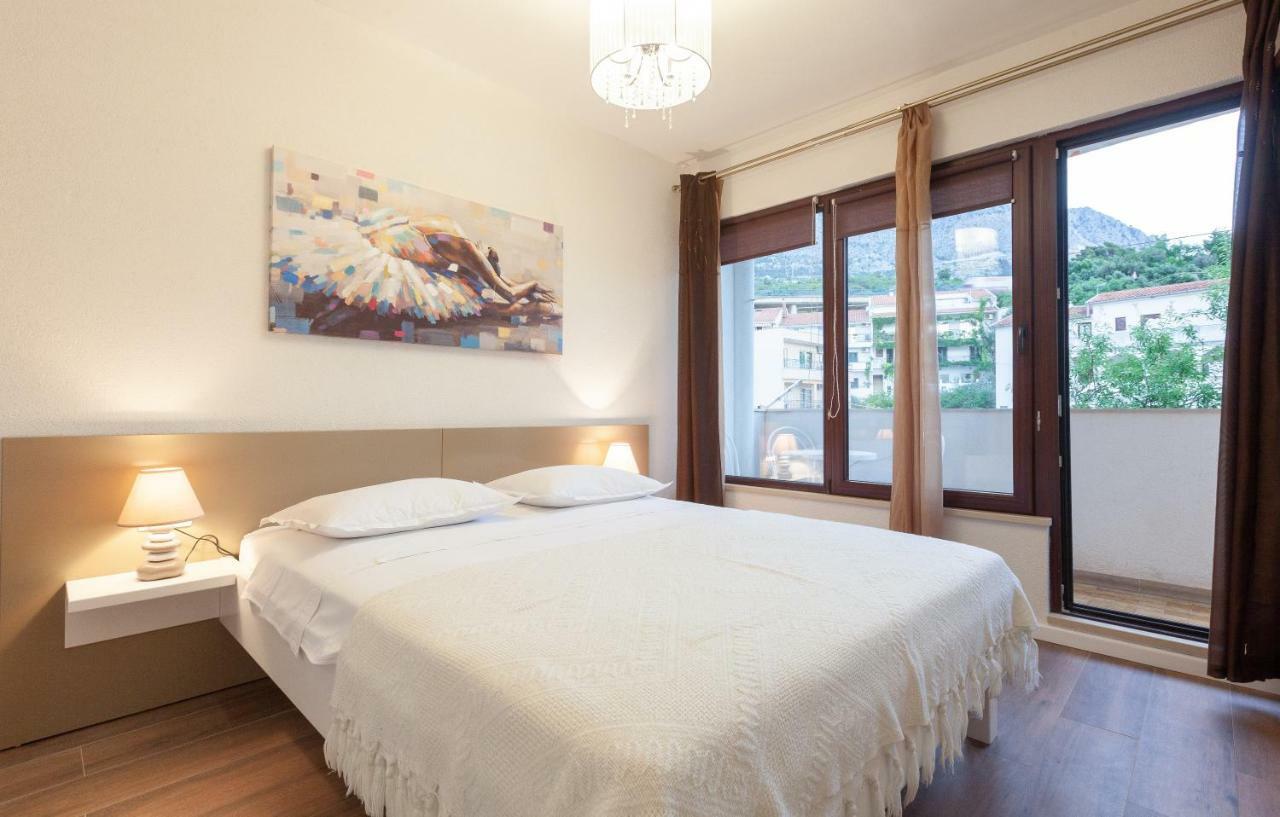 Apartmani Tina พอดโกรา ภายนอก รูปภาพ